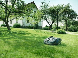 Robot tondeuse : pelouse en pente