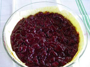 fond de pâte garni de compote de cerises