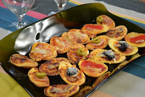 Mini-pizzas sortant du four
