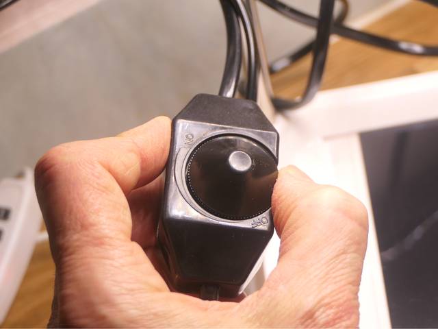 Bouton de réglage du tapis chauffant